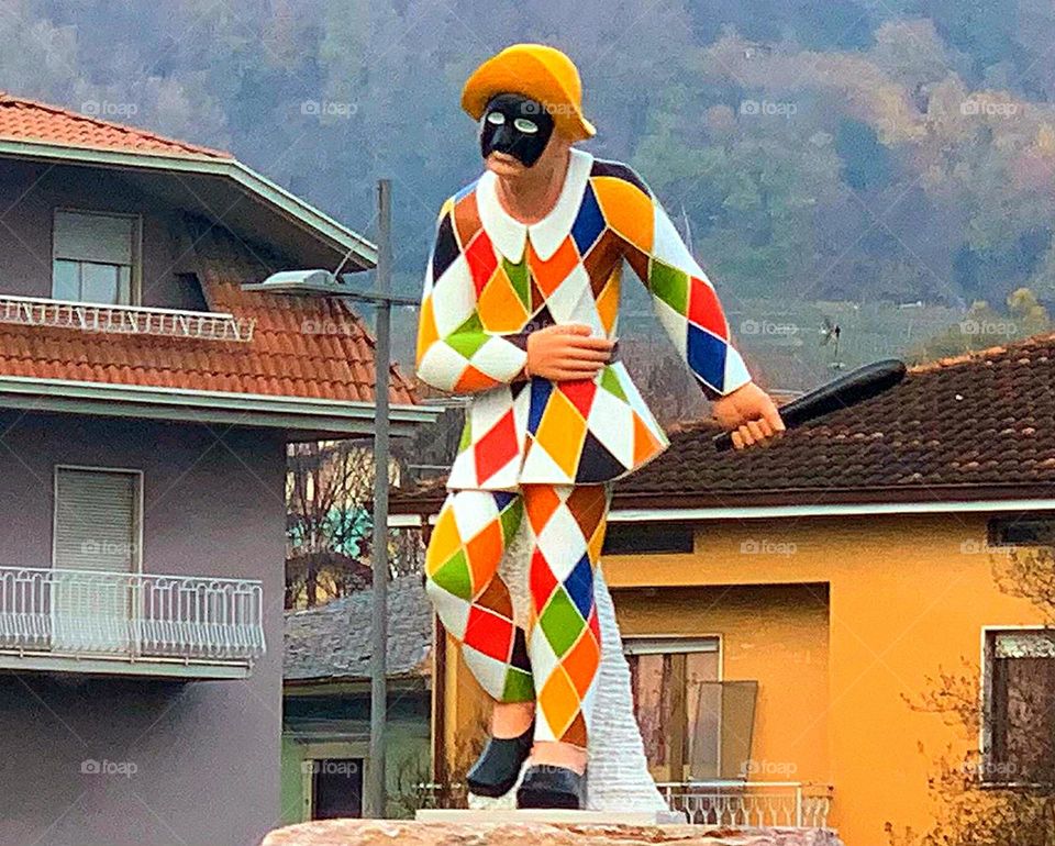 Rectangles.  Statue "Harlequin".  Harlequin clothes made of multi-colored rectangles.  Bergamo.  Italy