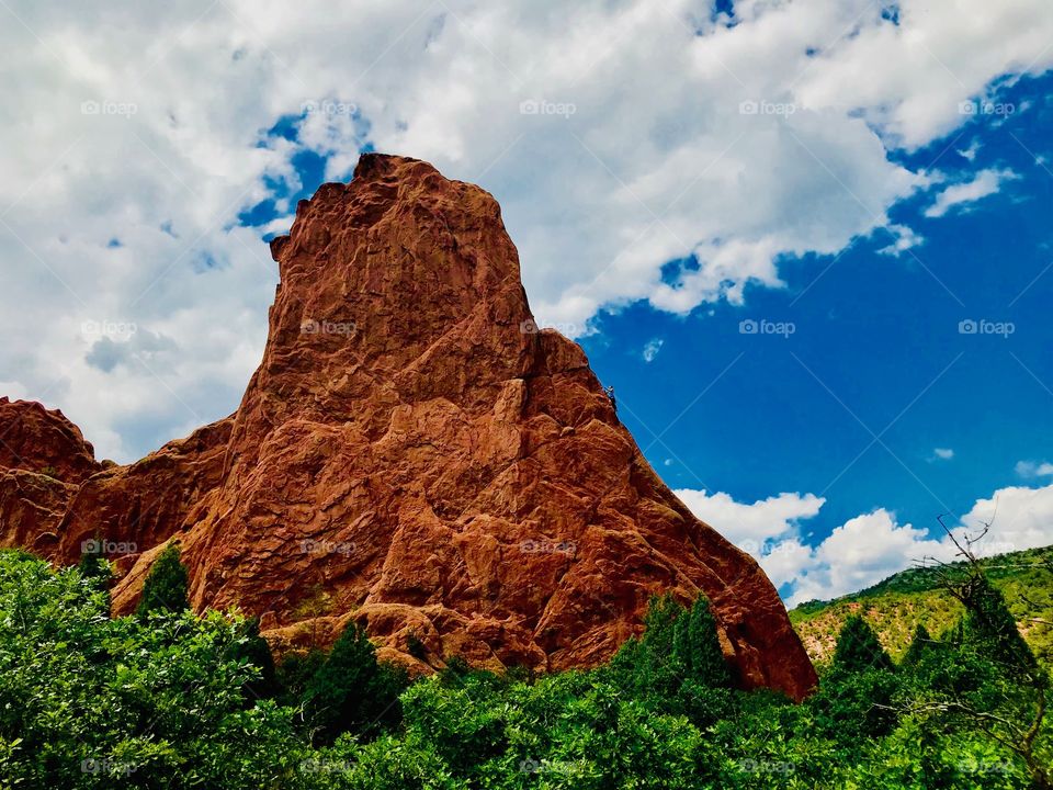 Rock formations at garden of the gods in Colorado Springs, Colorado on a beautiful summer afternoon. It was a beautiful day to hike through the park there is so much to see there