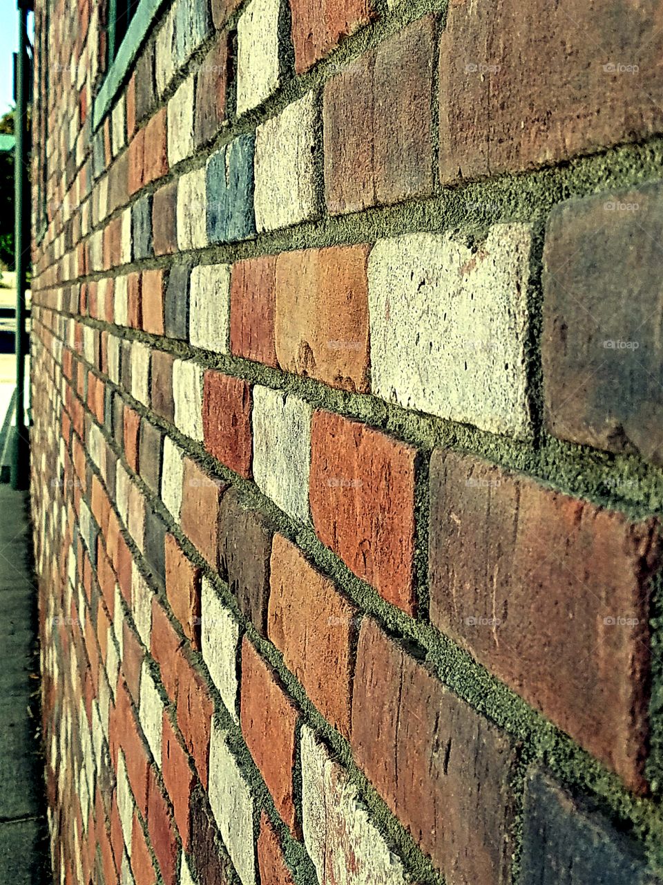 Brick wall in an alleyway.