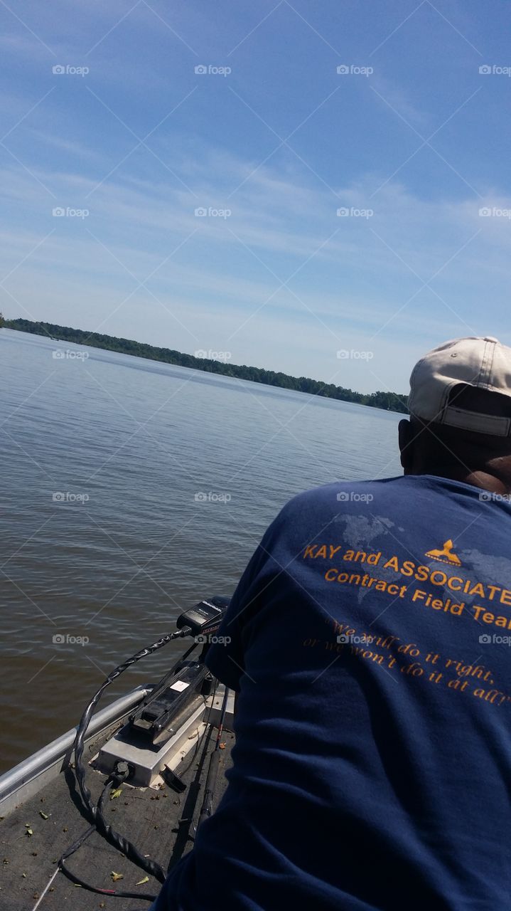 Lake over my shoulder . Fishing with my pop