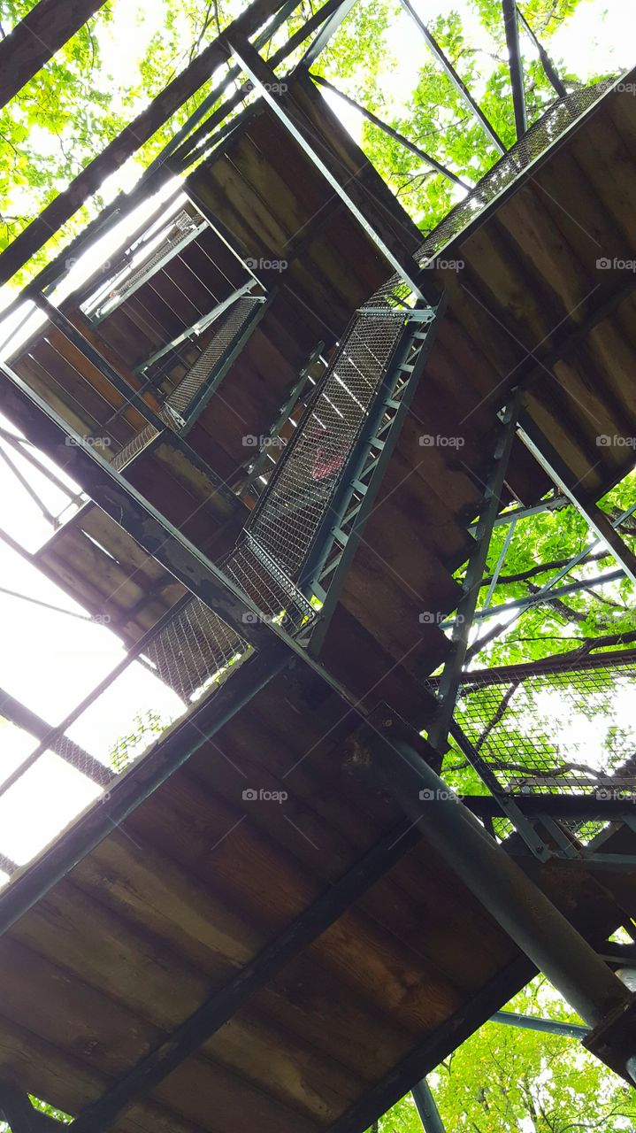 Looking at a forest fire tower from underneath.