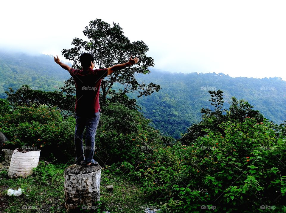 A man enjoying the nature on the mountain