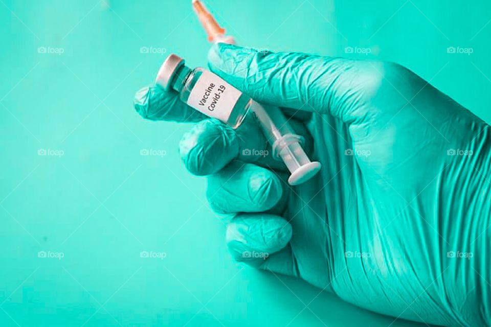 Covid 19 vaccine with hand