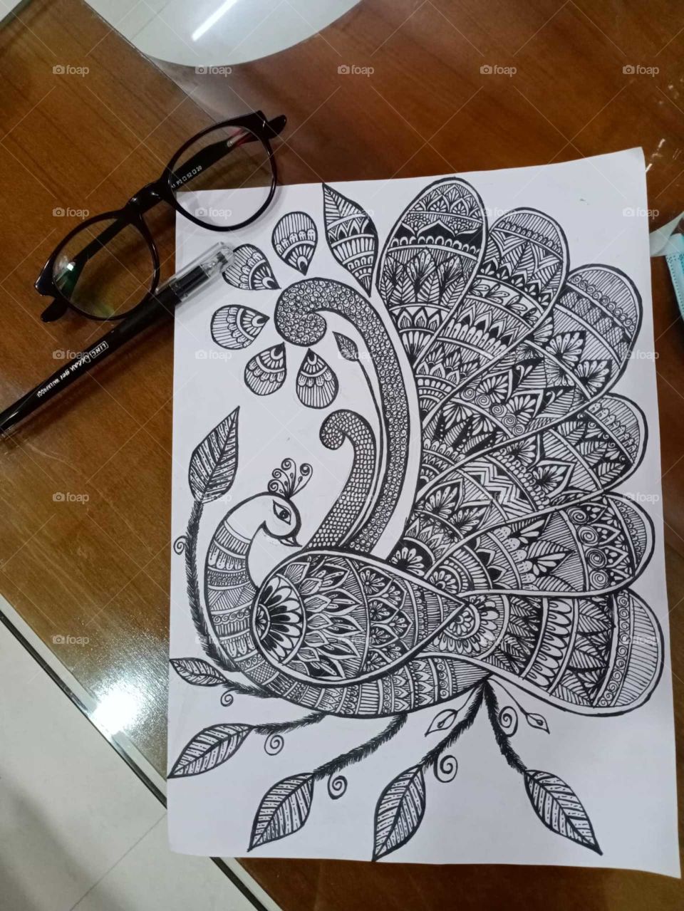 A beautiful bird, Peacock!! Mandala drawing drawn by my best friend!! 😍👌👏✌️💝