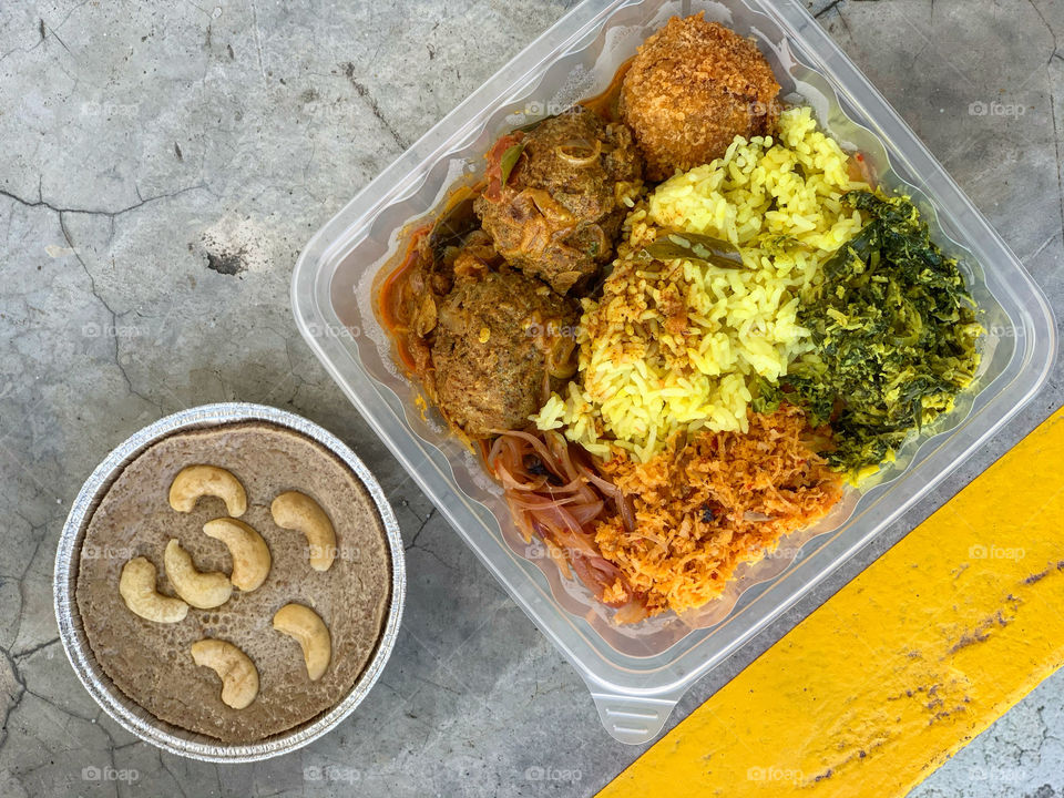 Authentic Sri Lanka meal with mutton meatballs, seeni sambol, pol sambol, spinach mallum, watalappam 