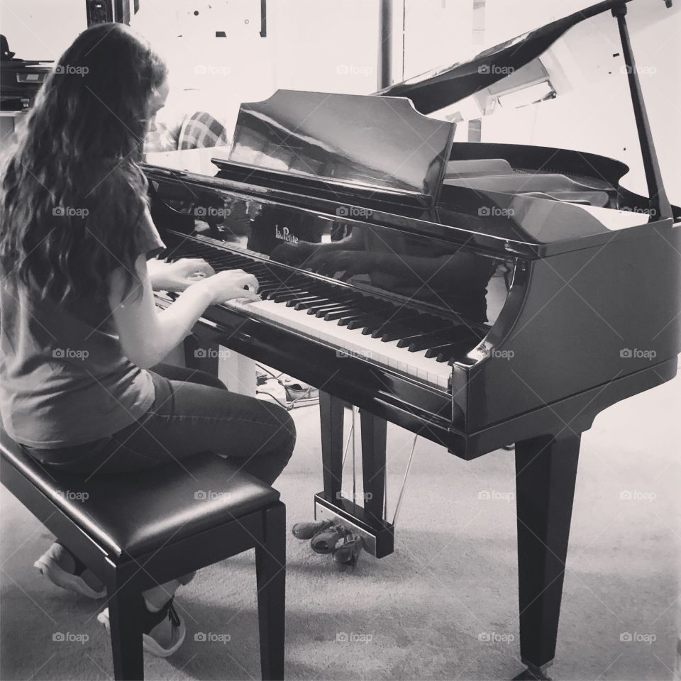 Girl playing piano 