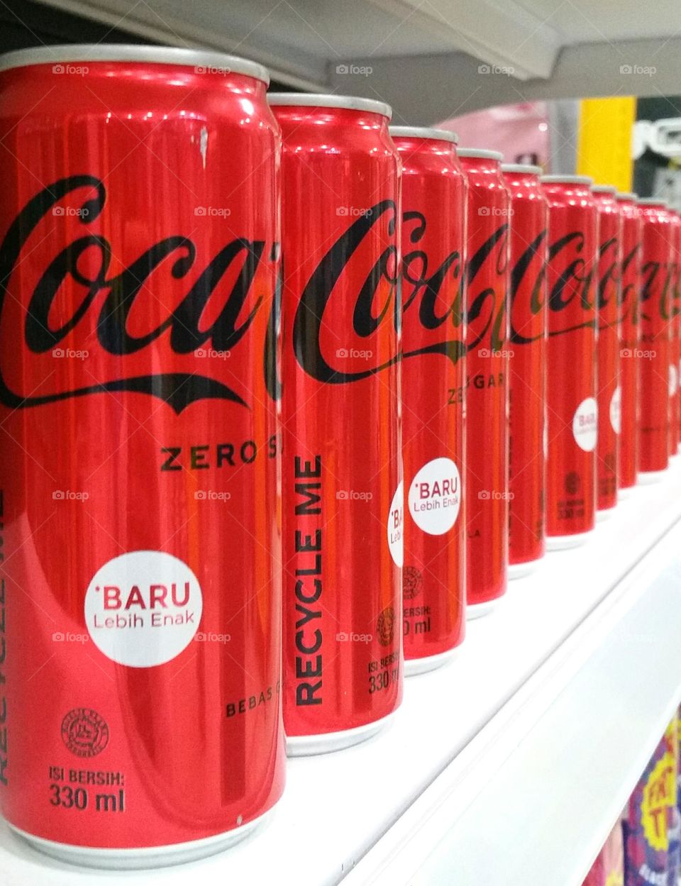 Coca-Cola cans in store