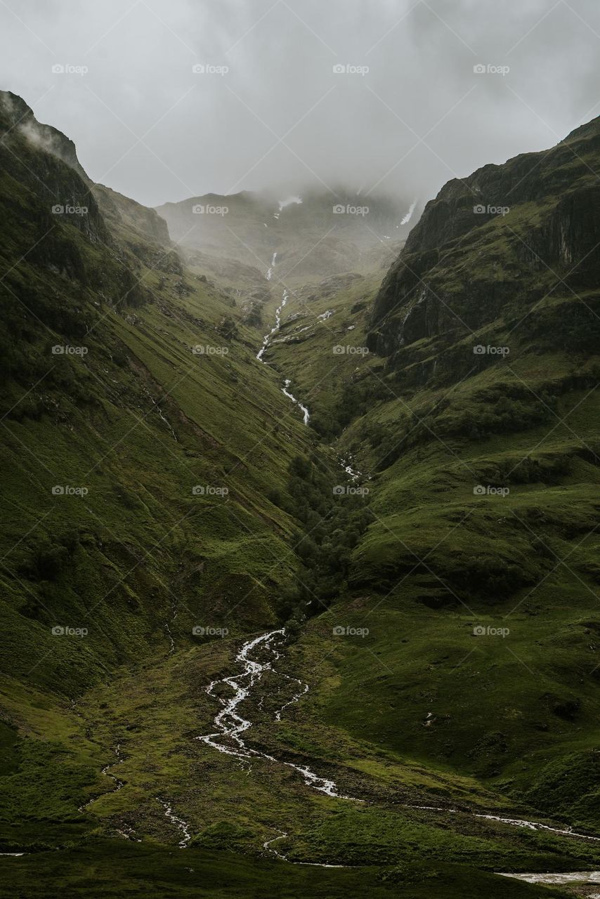 stream between mountains