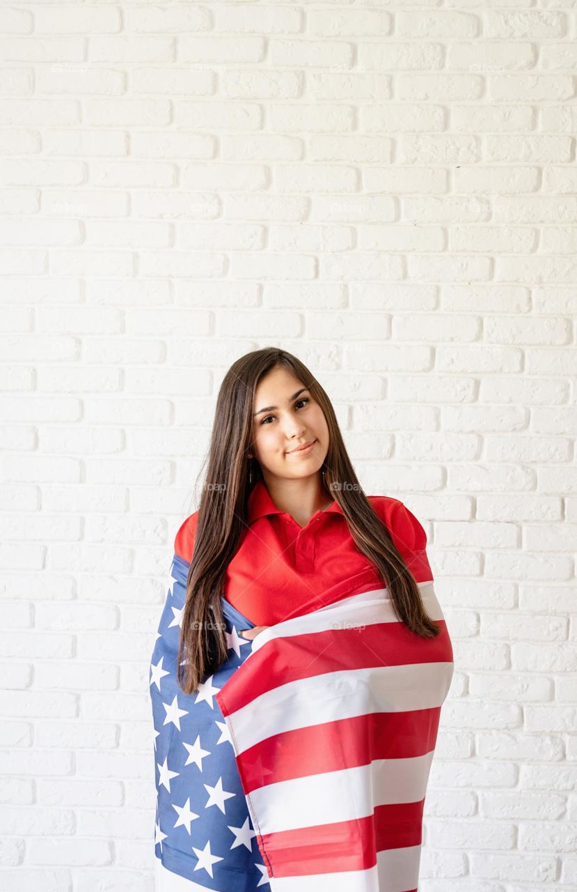 woman holding USA flag