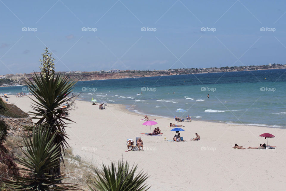 beach ocean sky people by istvan.jakob