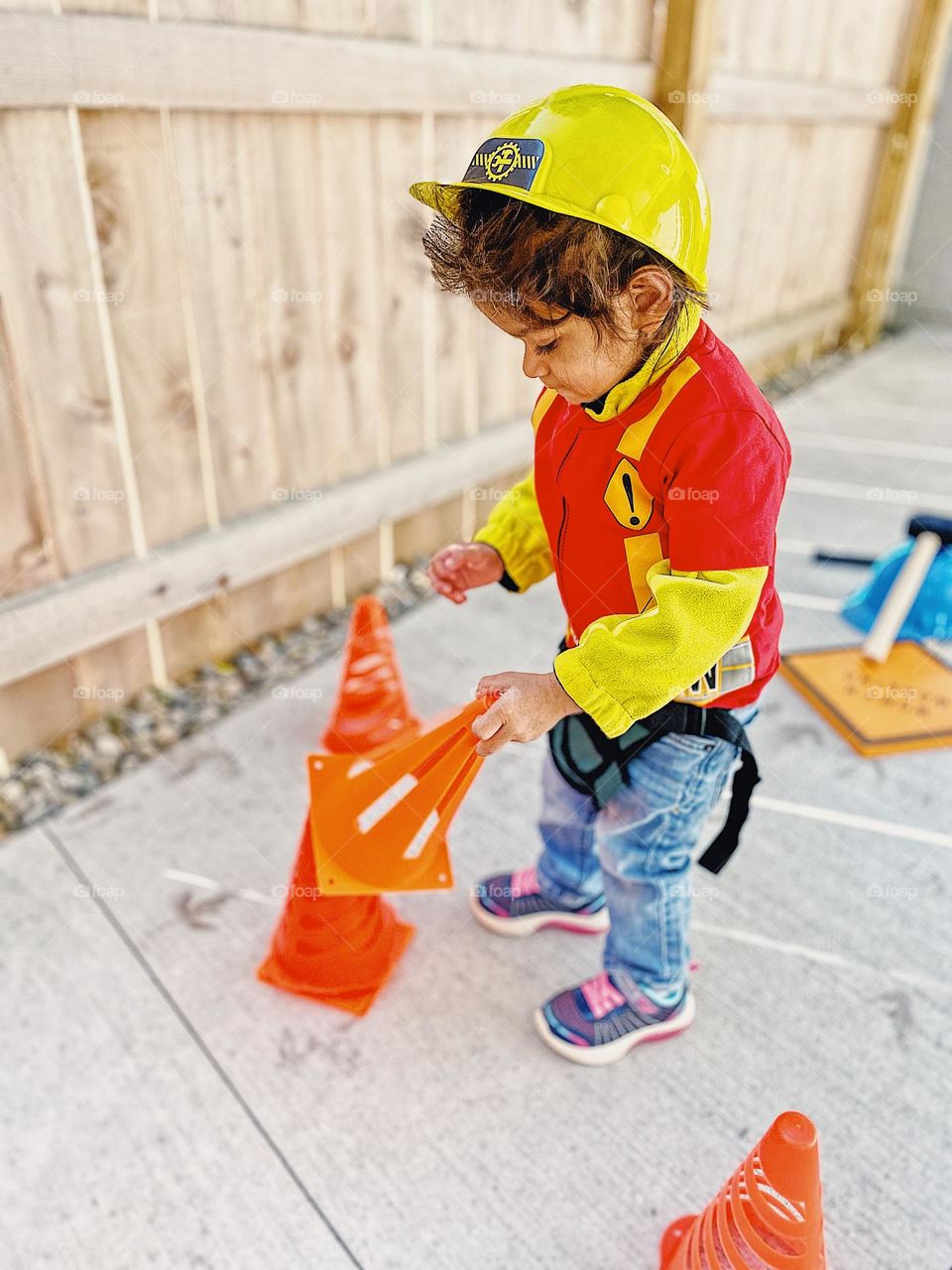 Toddler girl dressed as construction worker, toddler dresses in costume for Halloween, ready to go trick or treating, construction worker costume, Halloween with toddlers