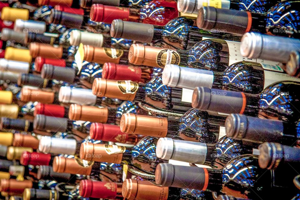 Many bottles of wine for sale. 