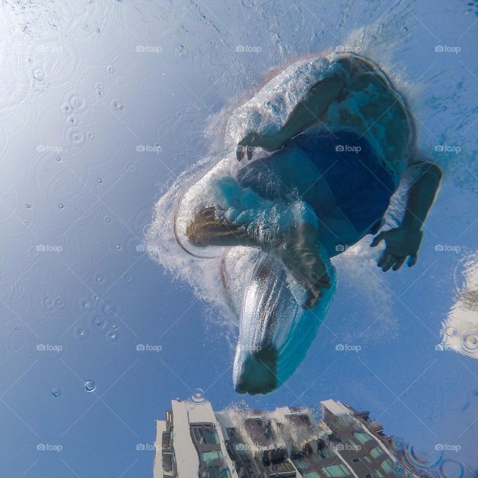 Person jumping in water