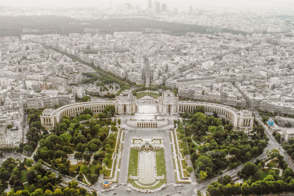 Symmetrical curved Palais de Chaillot, Paris, France, taken from the viewing platform atop the Tour Eiffel. The Palais houses 3 museums & fronts onto the Place du Trocadero & the equally symmetrical Jardins du Trocadero. 🇫🇷