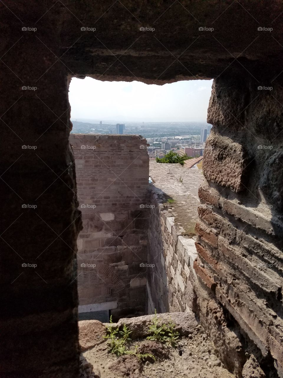 a view from a window in the ankara castle in Turkey overlooking the city