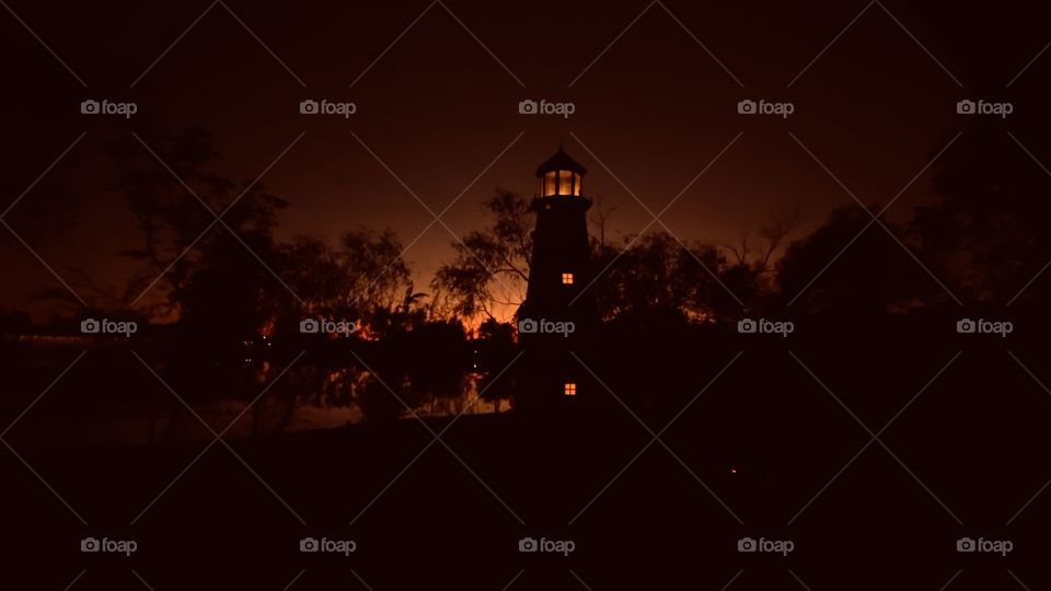 The Day is Done the Lighthouse is on Alert to provide passage to all. The Sun’s Evening Glow is almost Complete. Awaiting a New Day.