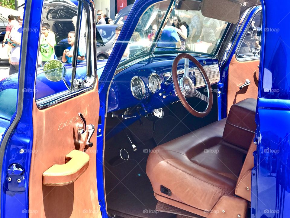 Close-up of a blue old-fashion car