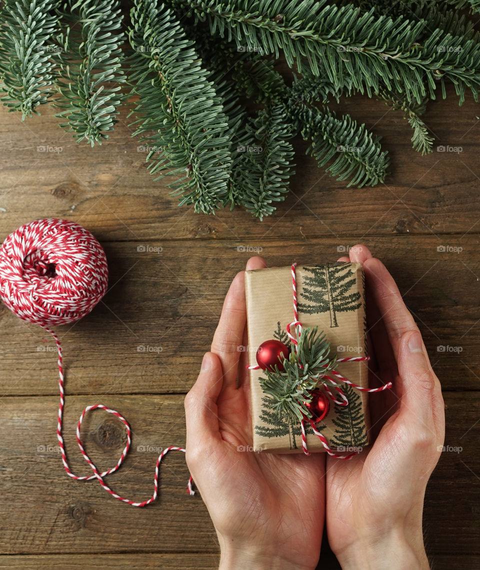 A person holding a gift