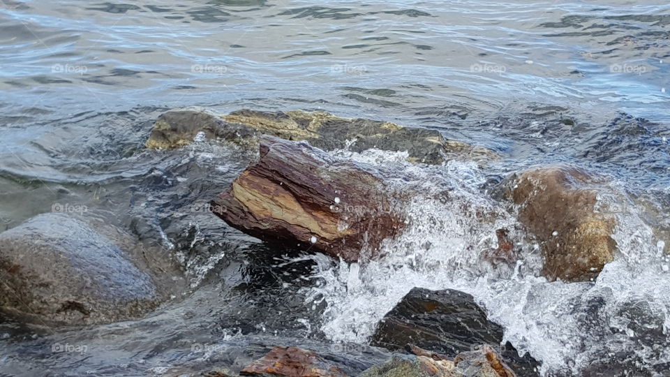 Waves splashing on the Maine coast