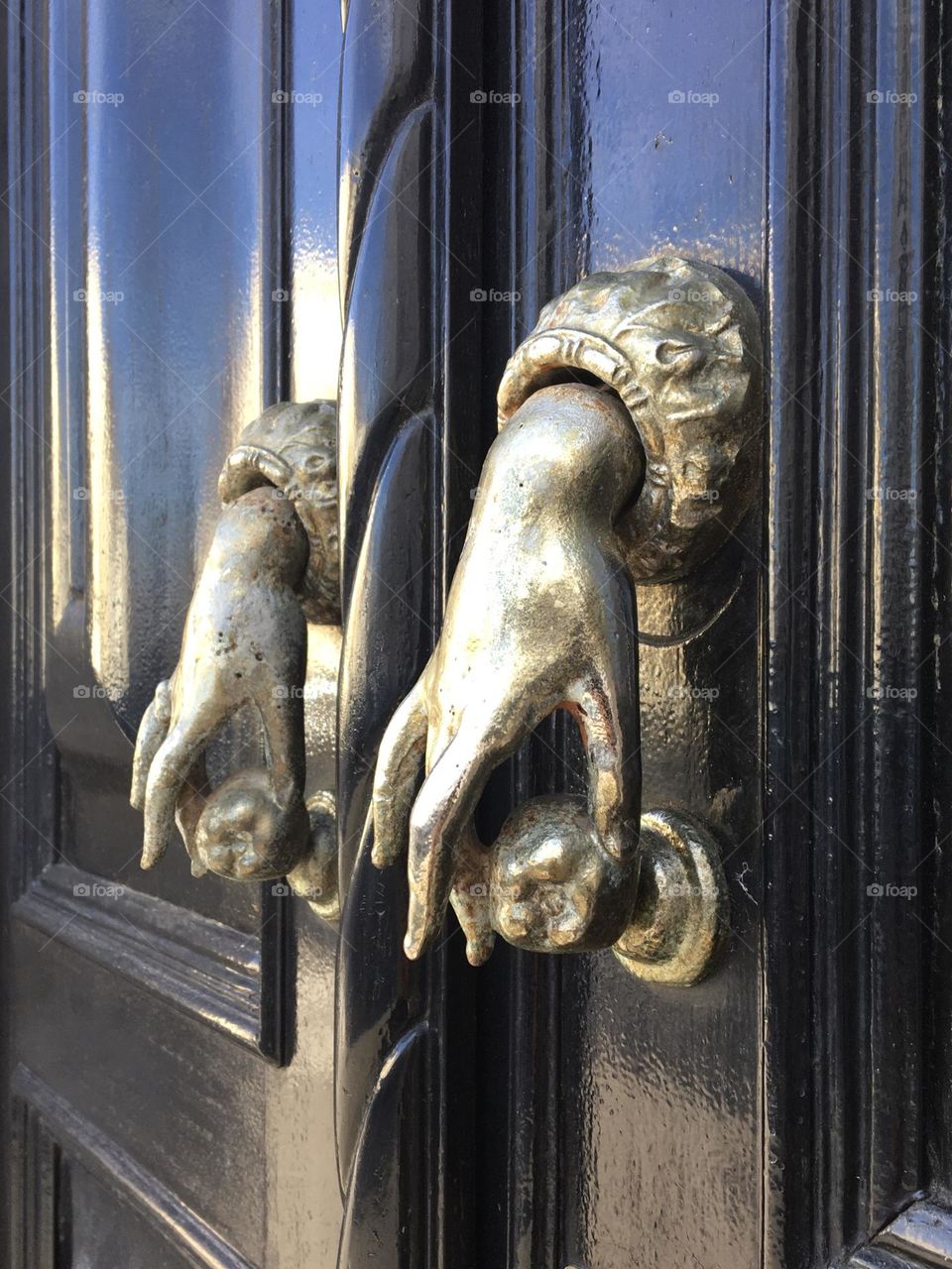 Woman’s hands as bells