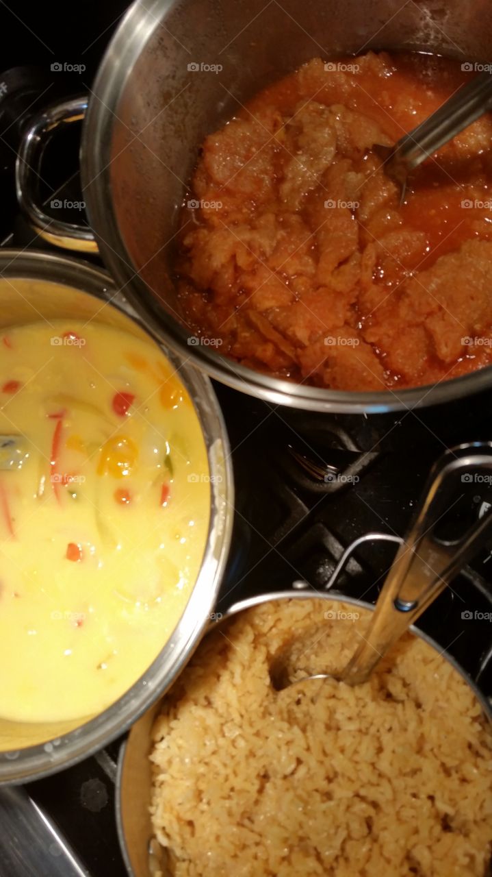 Homemade cheese sauce with sautéed, hot and sweet, peppers served as a condiment, with tortillas,  with tortilla chips, with favorite meals where cheese sauce is enjoyed