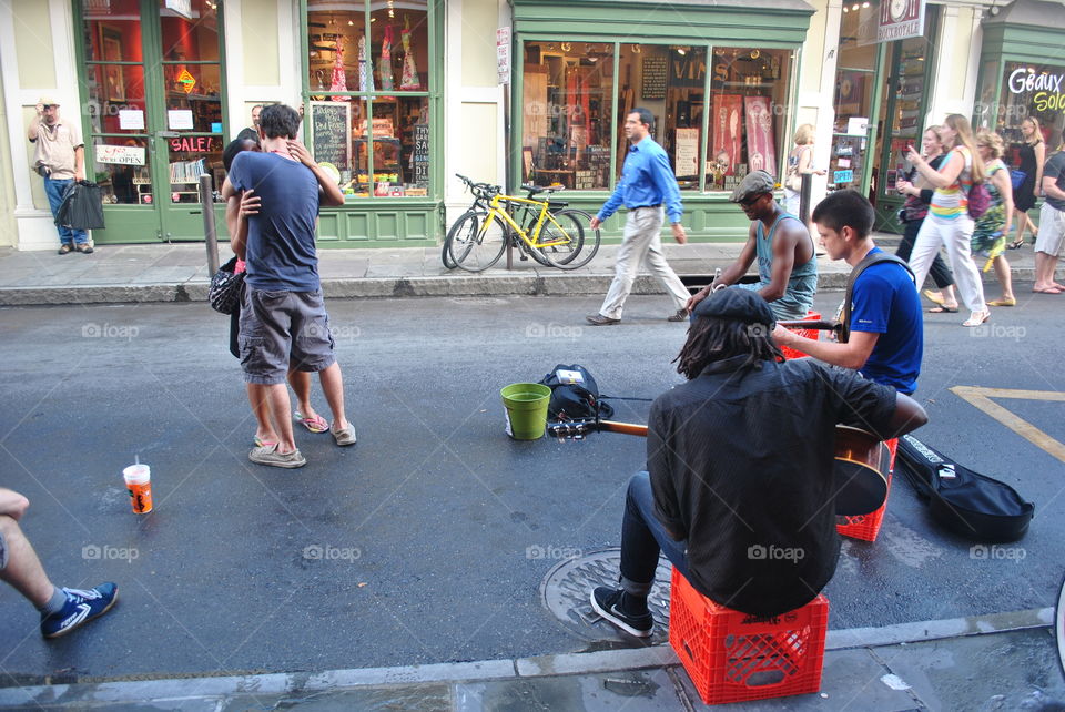 A couple dancing on the street in New Orleans