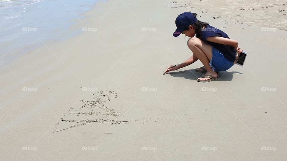 Girl On Sandy Beach