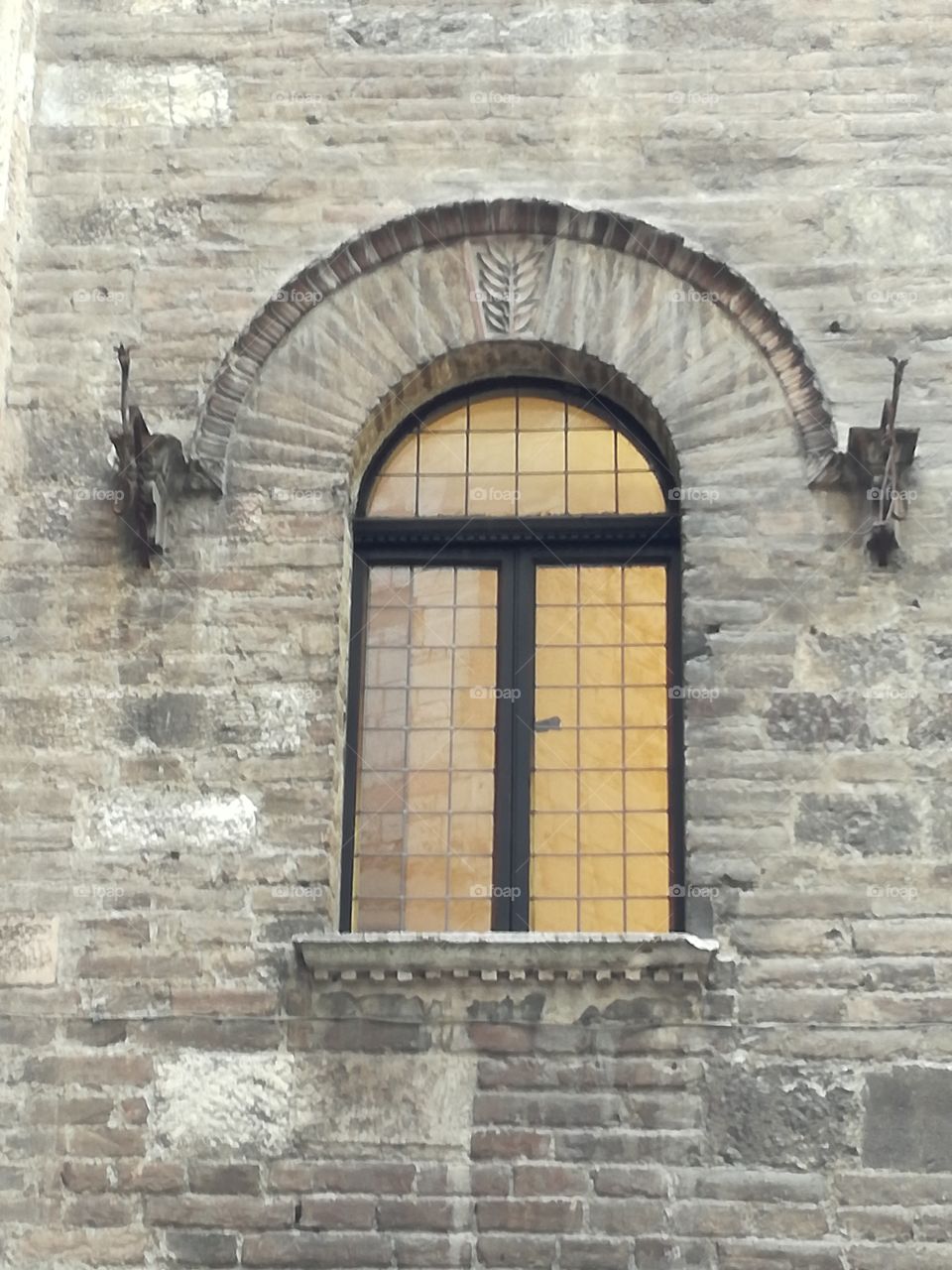 An antique window in Perugia