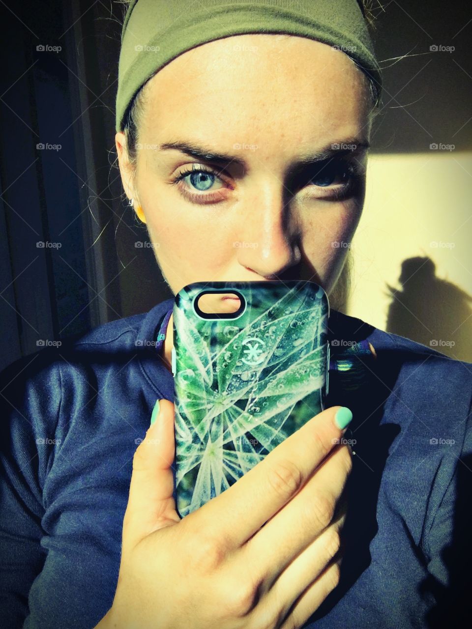 Woman holding phone case