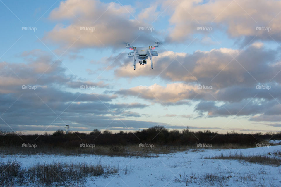 Phantom drone in the air taking pictures.