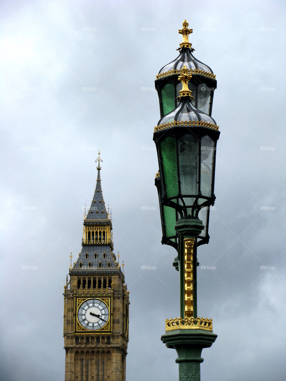 Big Ben tower and street lamps 