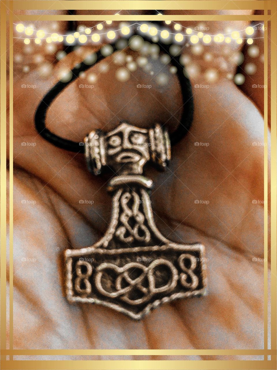 Thor Mjolnir pendant. It is an enchanting and magnificent sight.