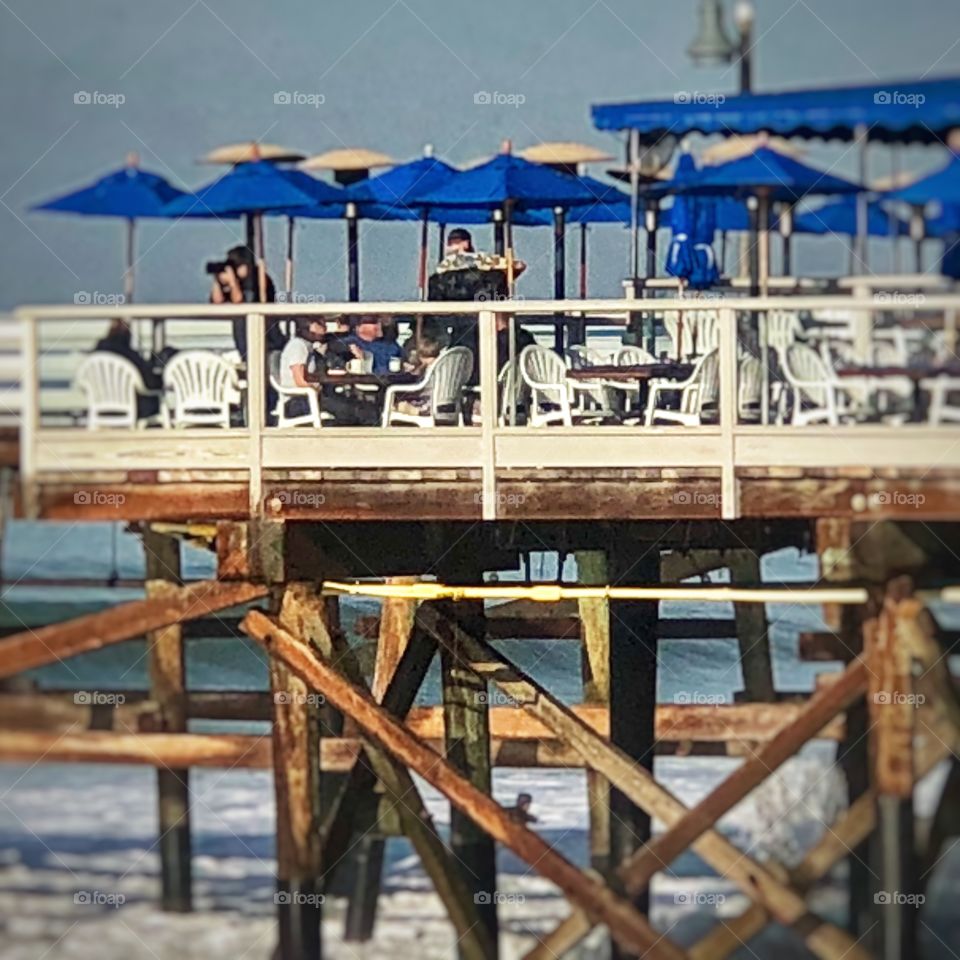 Stunning and Beautiful Pier With Umbrellas