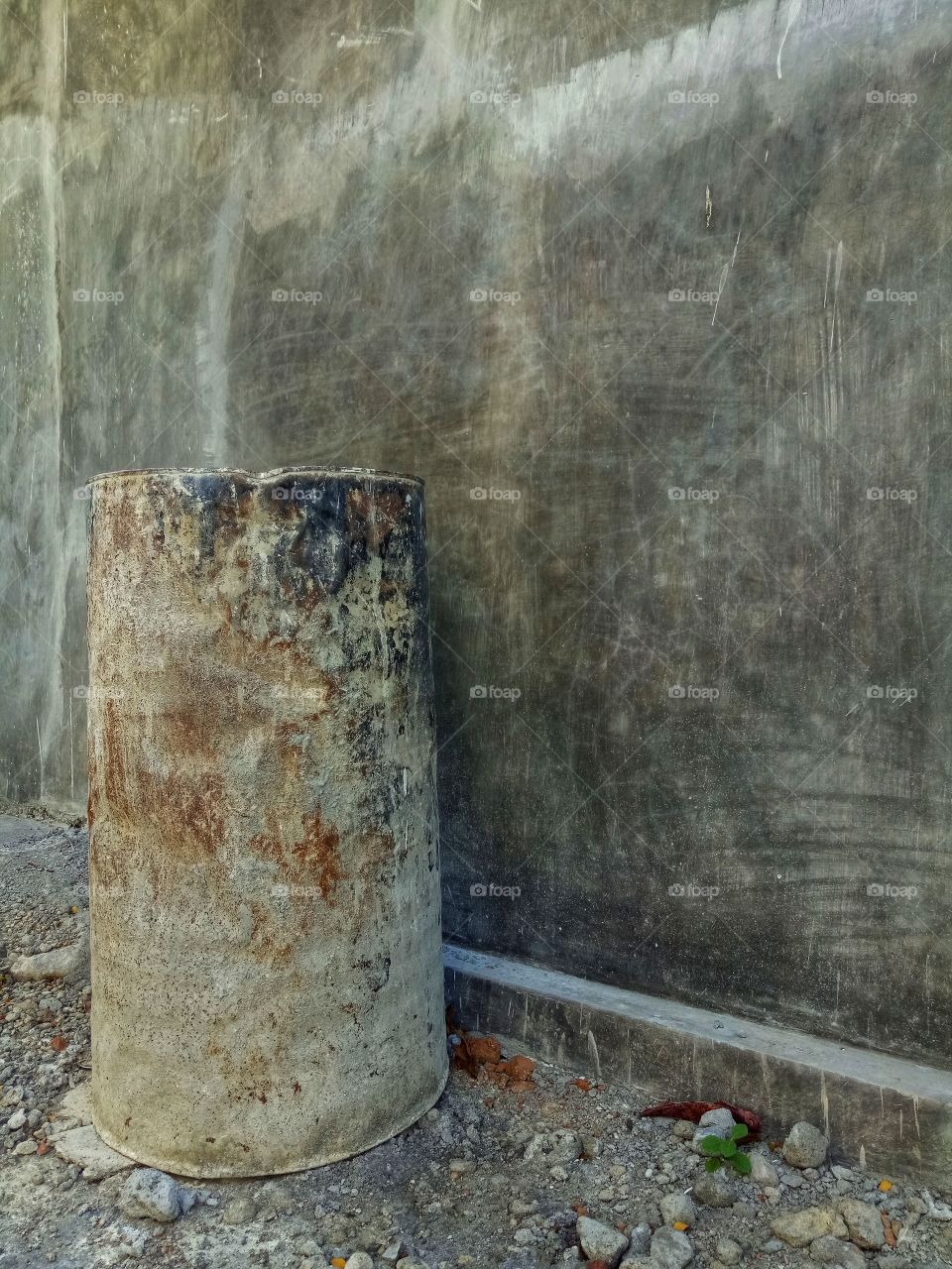 Rusty vat and wall cement background. Corroded and dirty