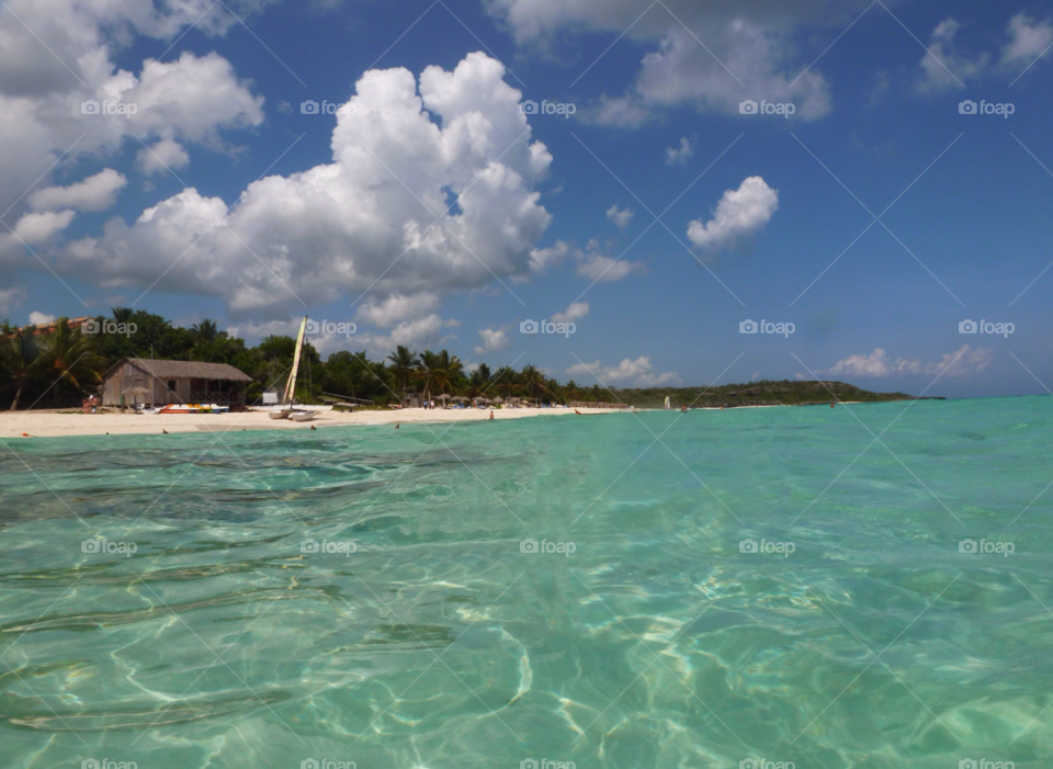 beach sky clouds sea by ijbailey