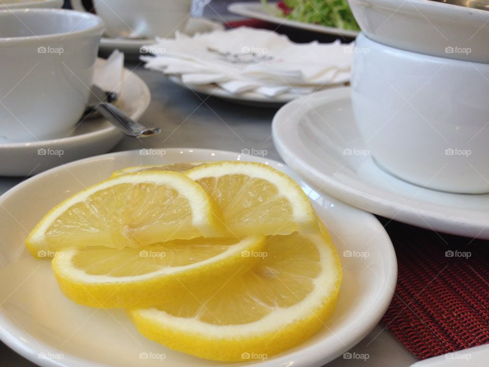 Yellow Lemon on the saucer