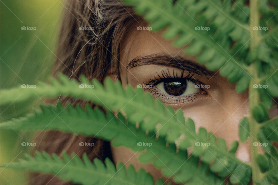 brown eyes, fern, portrait of a girl with a fern