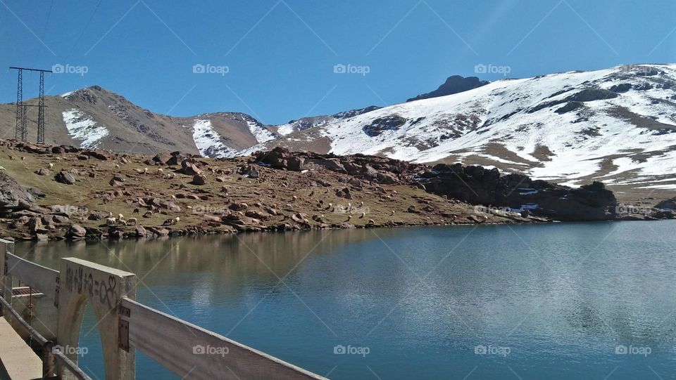 magic lake surrounded by land.