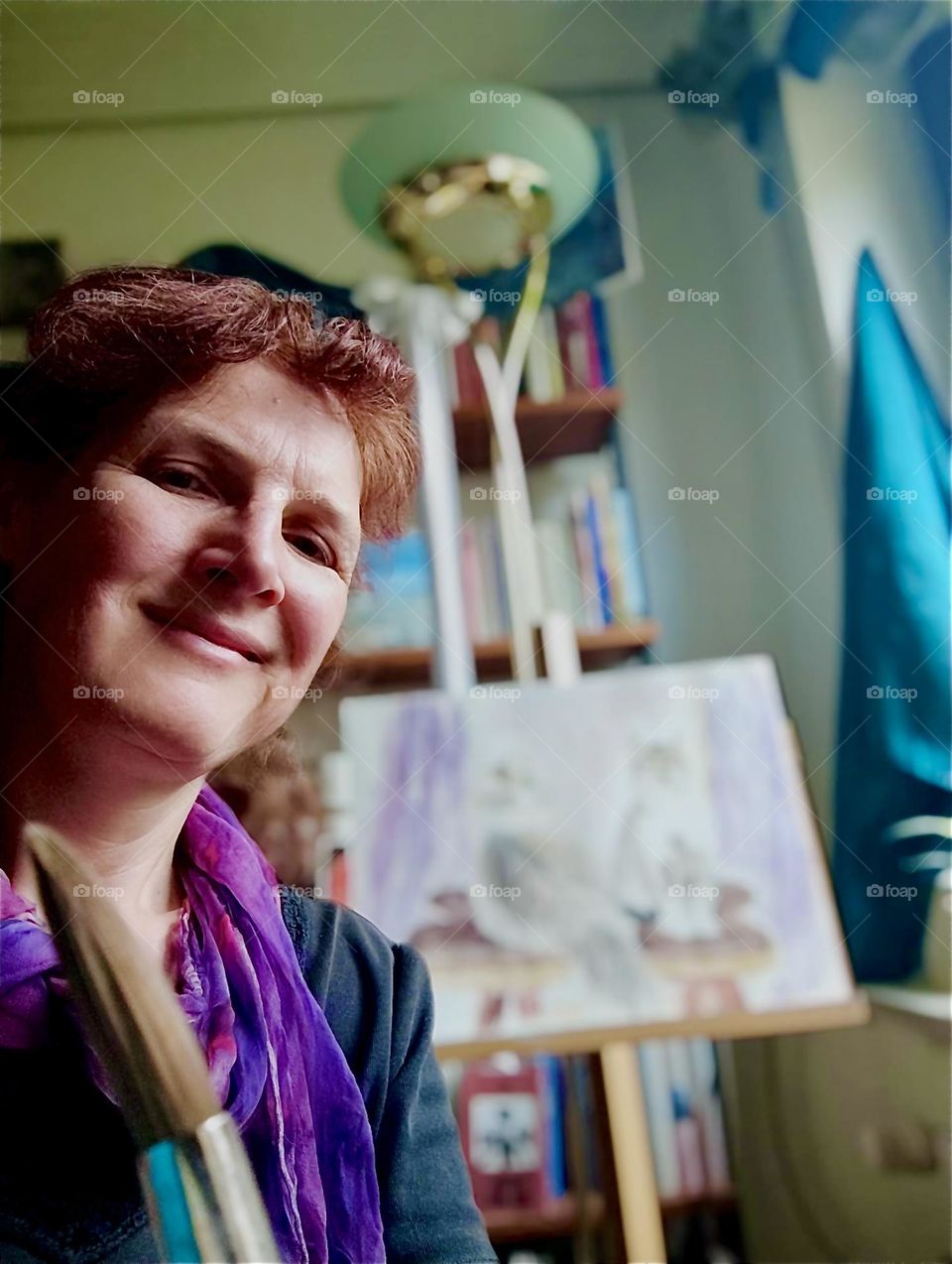 This lovely young lady who lives in “Bavaria”, Germany is the caretaker of two brother and sister cats named “Roukey” and “Linda” whom she has lovingly portrayed in the drawing  displayed on the easel stand. 2024. Hypnotic Productions