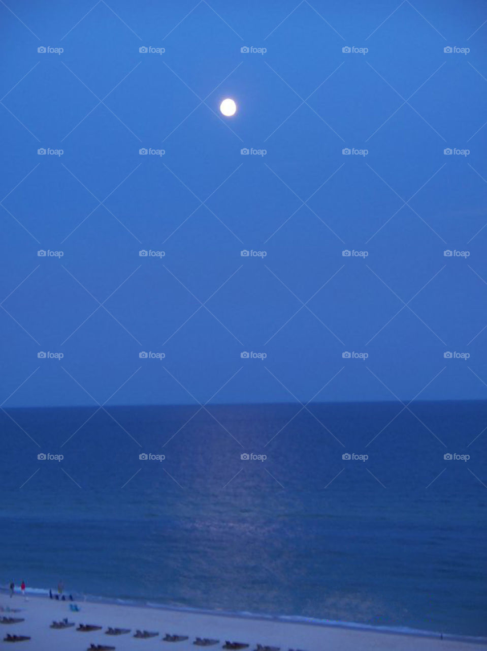 Moon Rising Over the Gulf. The moon rising over the Gulf of Mexico in Orange Beach Alabama.