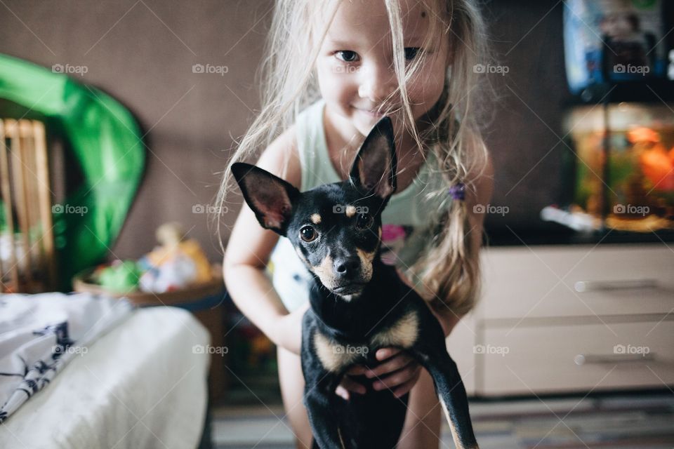 Baby and a puppy