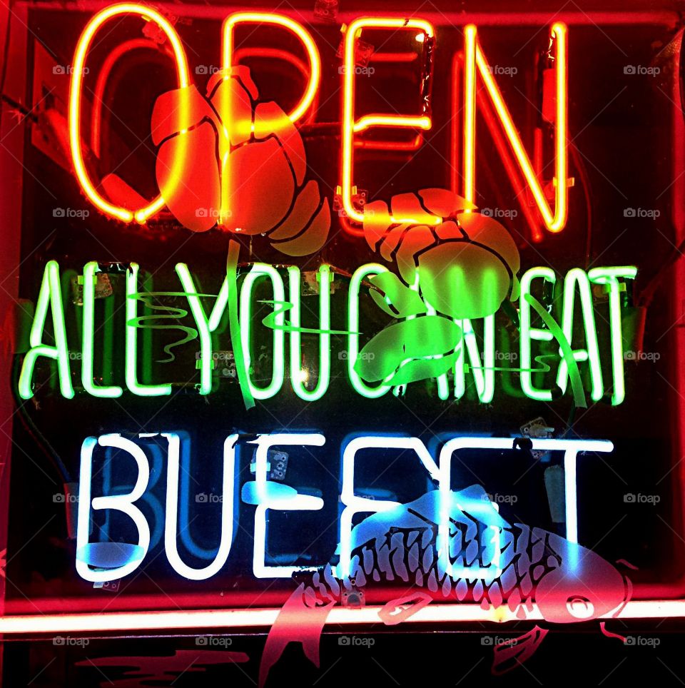 Let's eat. Neon buffet sign
