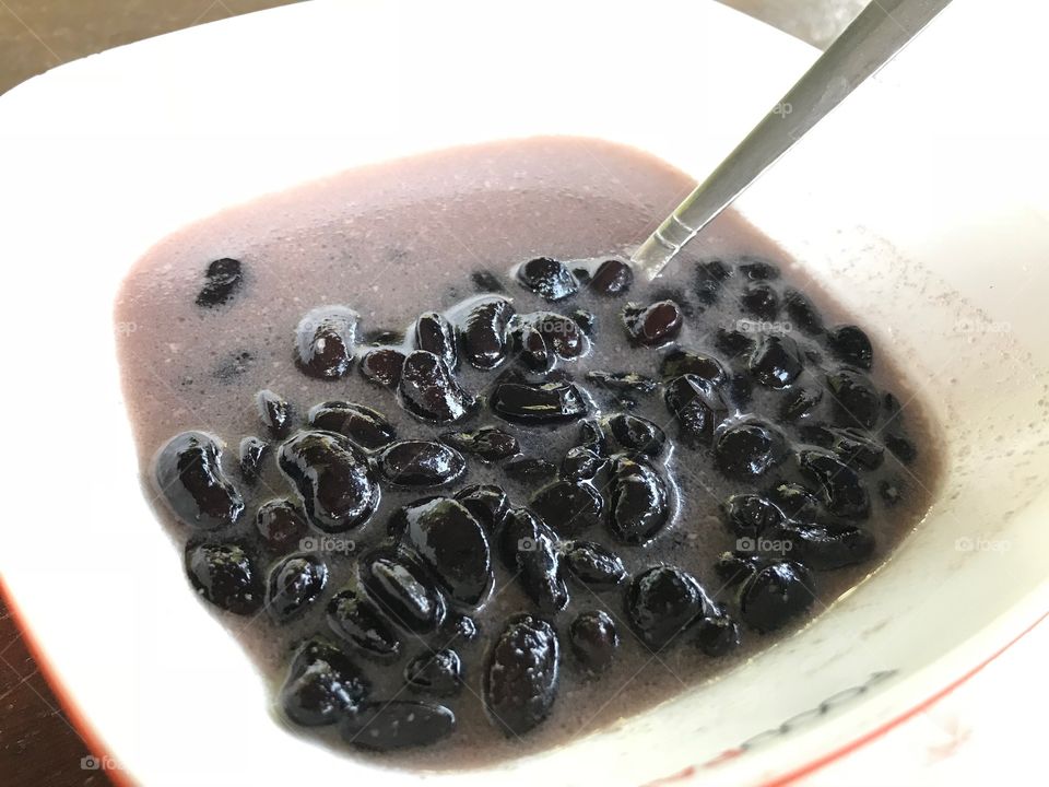 Sweet boiled black bean with coconut milk