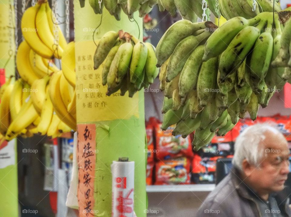 Bananas Hanging In A Chinese Market. Chinese Street Market
