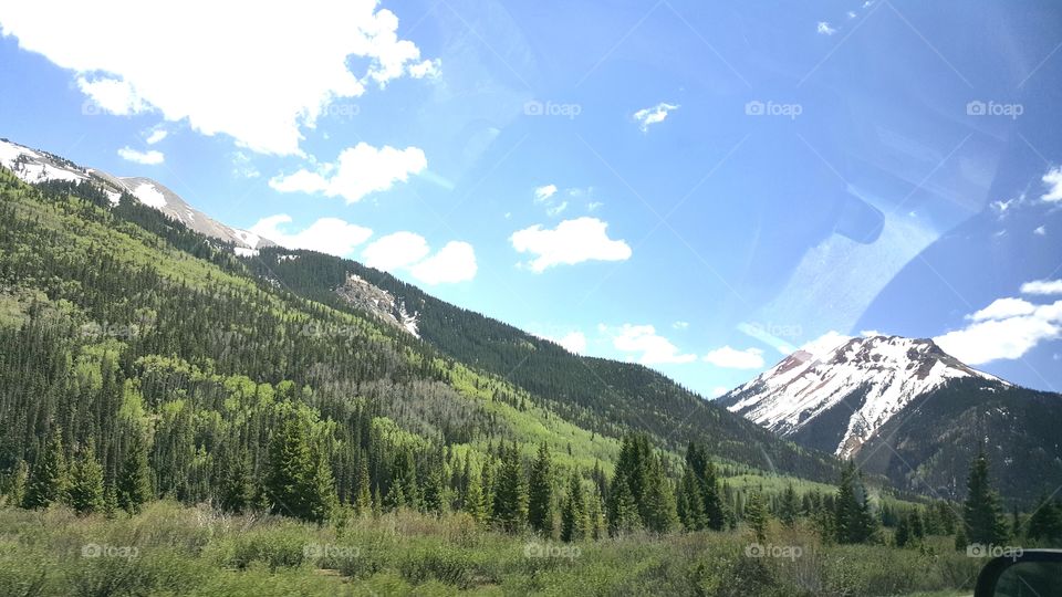 Colorado Views. #mountainrange #snowtips #treesgalore #thisismyhappyplace #blueskiessaveslives