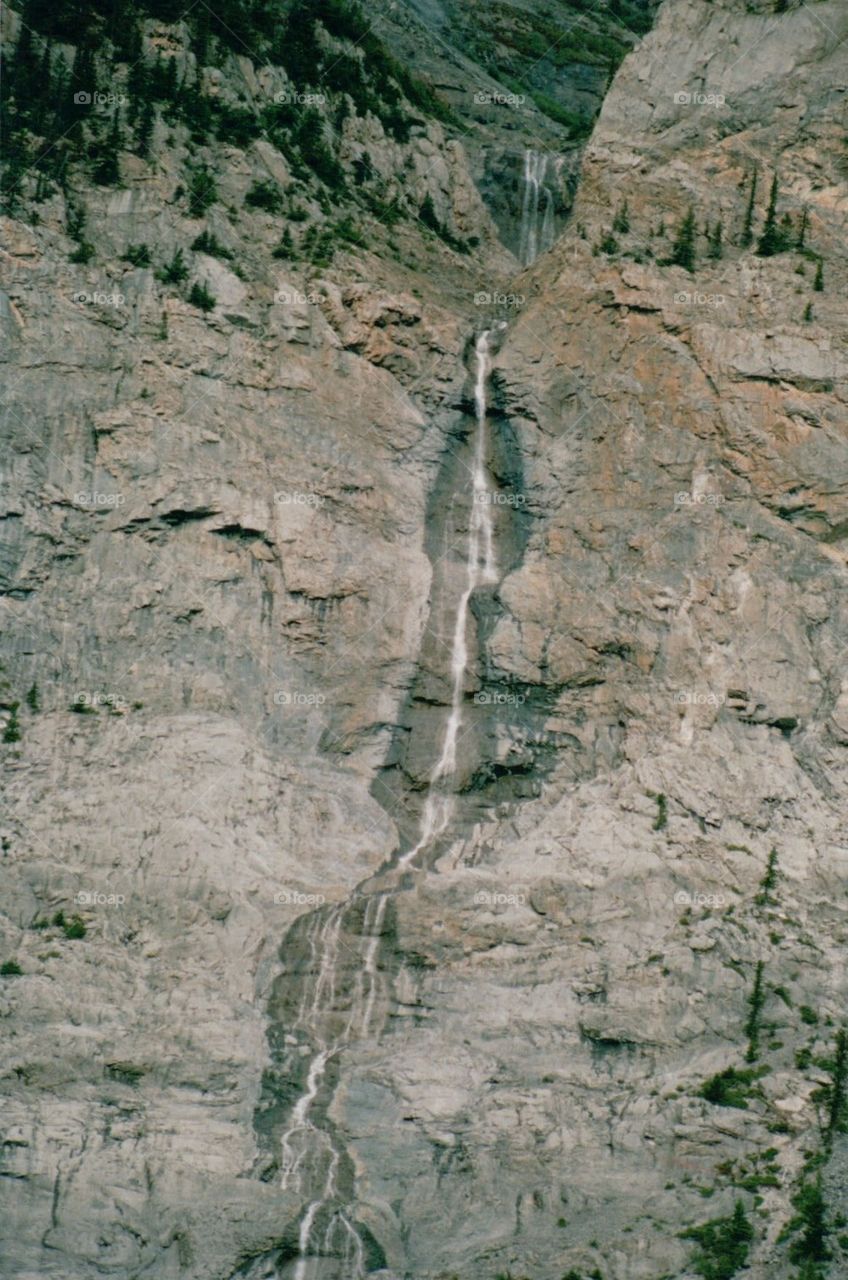 Rocks with tall water fall