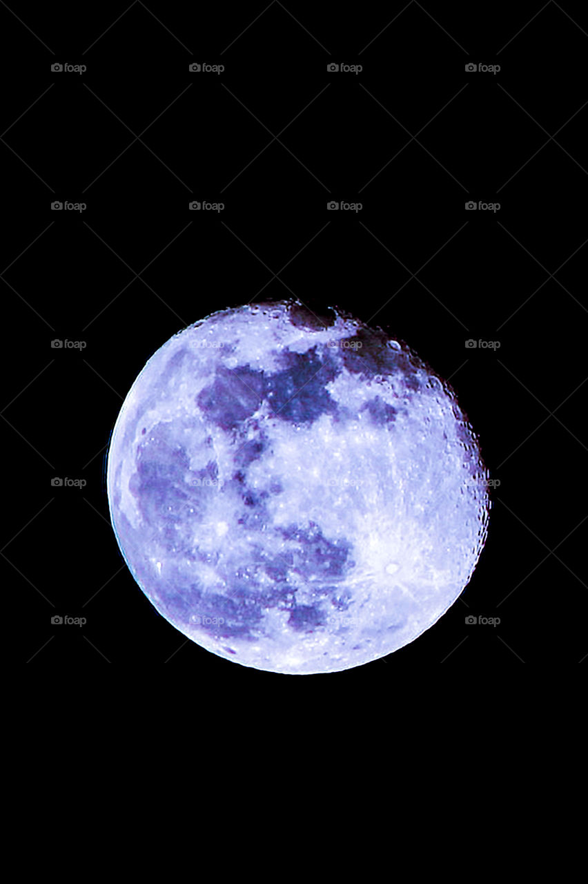 Night: Once in a blue moon?? This nighttime shot of a just past full moon is completely real except for the slightly blue hue. A real blue moon would the 2nd full moon in one calendar month. Still beautiful? I think so!!! 💙