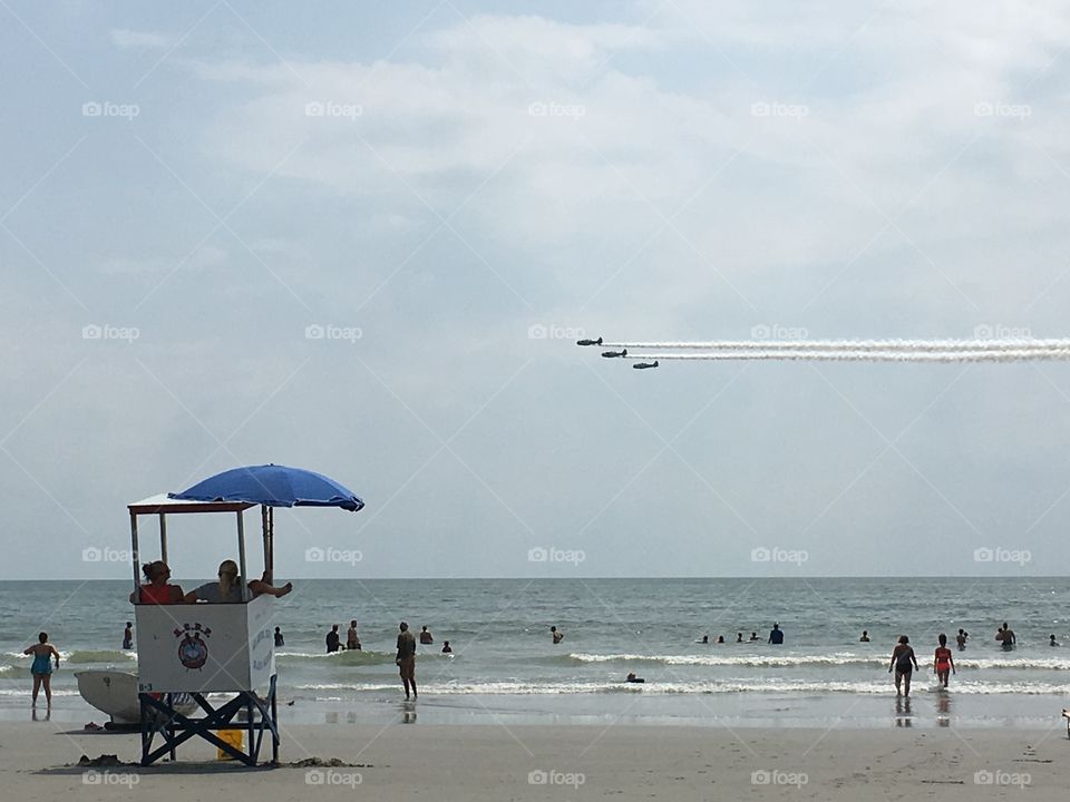 Air show flyover at beach 