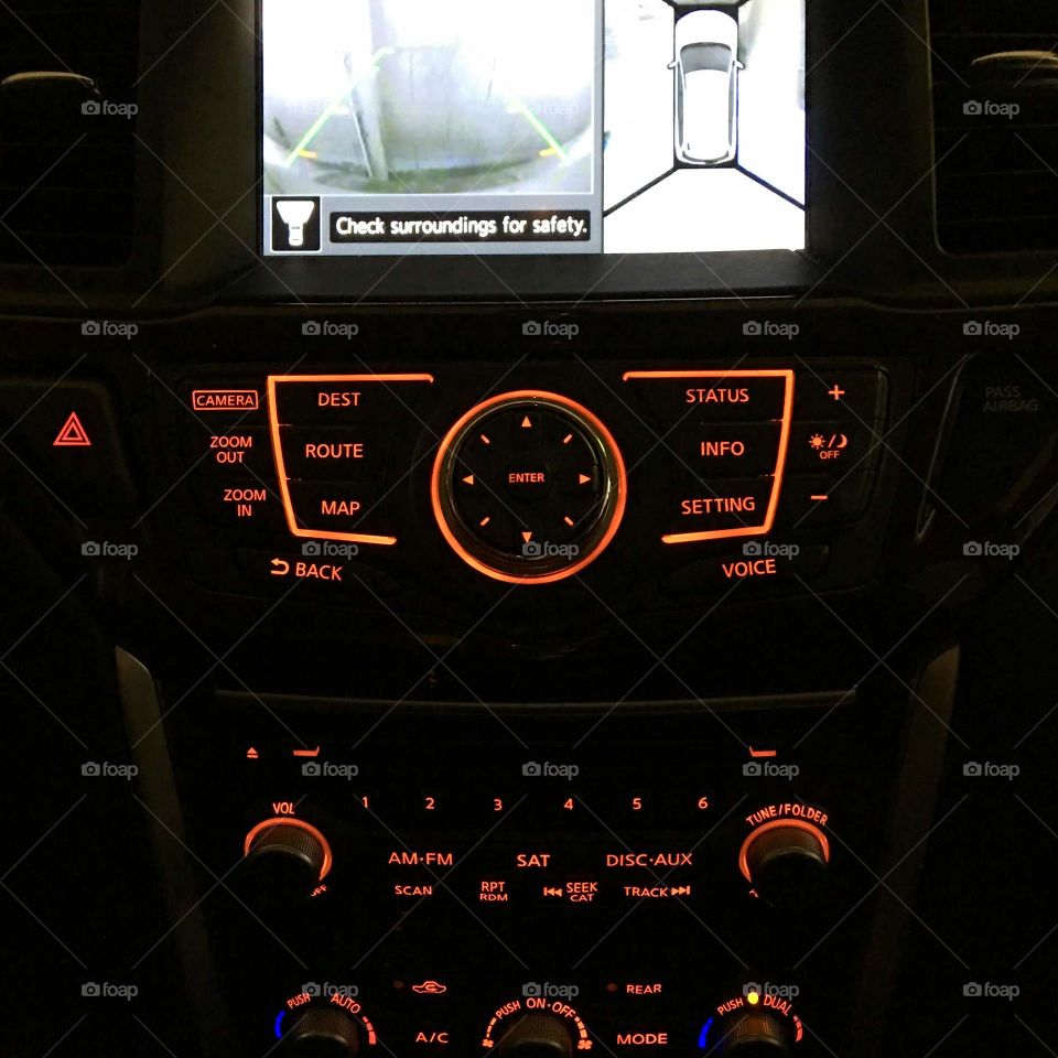 Car telling me to check my surroundings. Pretty interior dash are at night.