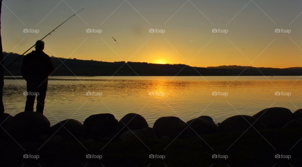 Fishing at sunset